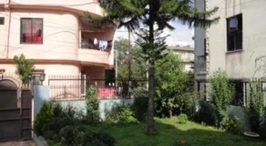 One room with two single beds with natural views - Image 2
