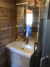 Chalet with a hot tub and terrace above the water - Image 2
