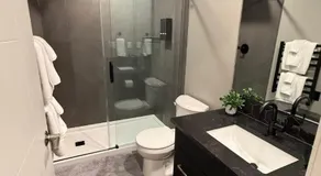 Luxurious and Cozy 1 Bedroom Basement Suite Patio - Image 2