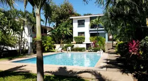 Minimalist Condo with a Beautiful New Design, Bound Patio, and Shared Community Pool - Image 4