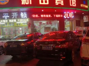 Xintian Lvye Hotel - Image 5