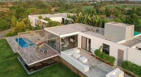 Open House by StayVista - Nestled in nature, featuring a Swimming pool & Expansive lawn for a serene retreat - Image 5