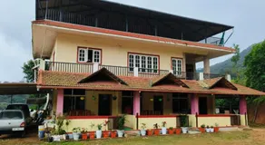 Nisarga Coorg Home Stay - Image 2