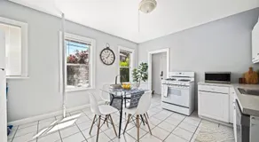 Cozy Up in 5BR Apt Near Charming Oak Square - Image 3