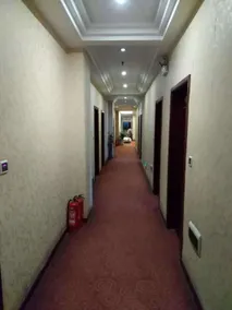 Shangcheng Business Hotel - Image 4