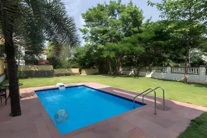 StayVista's Greenwoods Villa 10 - City-Center Villa with Private Pool, Terrace, Lift & Carrom Board - Image 4