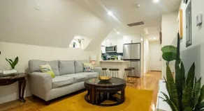 Breezy 3BR Boston Apt - Bathtub, Parking, TV, Walk to Train 803 - Image 2