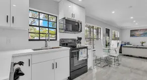 Cozy 4BR Family Retreat Near Beaches & Malls - Image 2