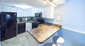 Appartement en copropriété avec terrasse, barbecue et jacuzzi | Vue jardin - Image 5