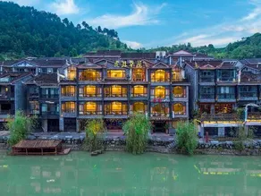 Hu'er Caowu Riverview Guesthouse - Image 5