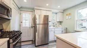 Spacious Family Home with Parking and Backyard - Image 3