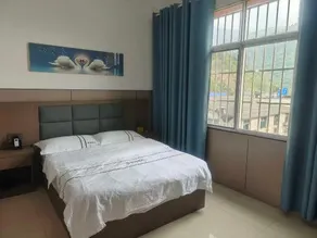 Manhao Longxiang Hotel - Image 3