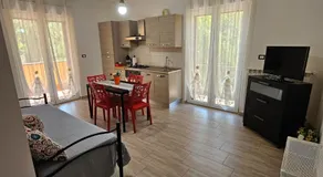 Villa Center appartamenti nel verde in città - Image 2
