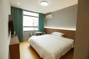 Sanhe Spring Business Hotel - Image 2