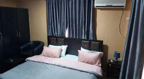 StayCation Suites And Apartment - Image 2
