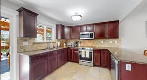 Charming four bedroom home with large yard and plenty of room for family - Image 3