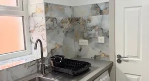 The Emerald Suite 1BR Apartment Near Etihad & Coop Live - Image 2
