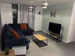 Cozy 2 Bed Apartment with Balcony Etihad Views, Steps from Coop Live - Image 2