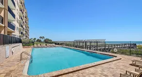 Ocean-view condo with a scenic balcony & W/D - pool and beach access - Image 3