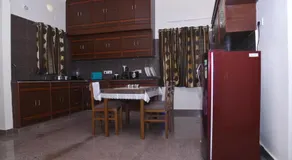 Four Seasons Homestay - Best Homestay in Tirupati- Luxurious Two Bedrooms Luxury AC apartments - Fast WiFi, Kitchen, Android TV - Easy access to Airport, Railway Station and to all Temples - Image 5