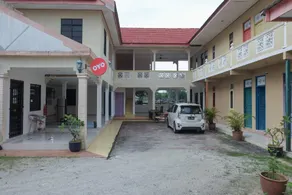 OYO 90018 River Village Hotel - Image 4