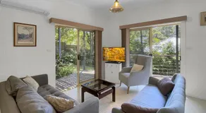 Relaxing 3-Bedroom Retreat with Outdoor Seating - Image 2
