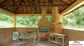 Linda casa em condomínio ecológico de alto padrão a 1h de SP, Terreno de 1500m2 com amplo gramado e piscina, WiFi para Home Office, Área gourmet com churrasqueira, forno de pizza e lareira aconchegante - Image 4