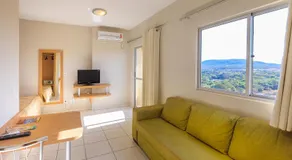 Flat com Piscinas Termais e Área de Lazer Completa - Image 2