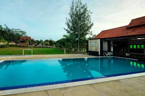 OYO Home 90745 Desa Balqis Beach Resort - Image 4