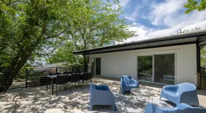 Relaxed Hillside Retreat with Hot Tub and Skyline Views - Image 3