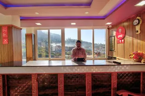 Capital O Hotel Rain Forest - Image 3