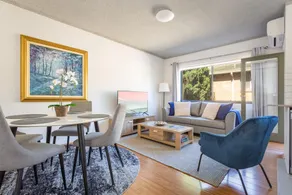Unit With Balcony, Backyard and Parking Near Shops - Image 2
