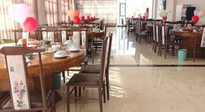 Bai Nian Sheng Shi Hotel - Image 4