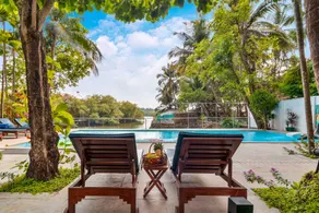 Casa Saipem with River View & Kitchen access by StayVista - Image 4