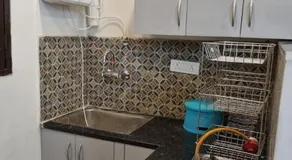 HOmeTEL-1 Bedroom Bath n kitchen Studio Apartment By Pushpanjali QLH - Image 4