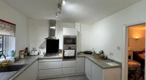 Comfy 2-bedroom townhouse featuring a fireplace, private entrance, equipped kitchen, terrace with garden views, washing machine flat-screen TV and sofa bed sleeping 2 additional guests - Image 4