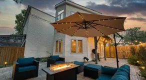 Patio Paradise Stylish 3BR Home with Gaming Room - Image 2