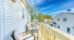 Patio Paradise Stylish 3BR Home with Gaming Room - Image 4