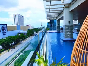 Cozy king bed with sofa bed Sunvida Tower Across SM Cebu with Balcony - Image 5