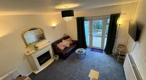 Comfy 2-bedroom townhouse featuring a fireplace, private entrance, equipped kitchen, terrace with garden views, washing machine flat-screen TV and sofa bed sleeping 2 additional guests - Image 2