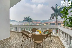 StayVista's Brookvale Cottage - Dive into tranquility with pool view and gazebo - Image 5