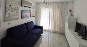 Acogedor apartamento en Daimús a 150 metros de la playa con parking privado y piscinas comunitarias - Image 2