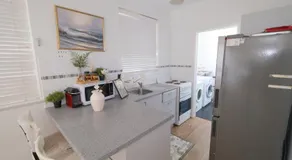 Relaxing Two-Bedroom Retreat Near the Airport - Image 5