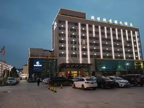 Yuanming Lake Junlan Hotel - Image 5