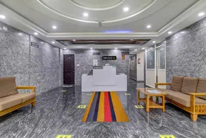 Townhouse OAK SRK White Inn Near Ragigudda Sri Prasanna Anjaneyaswamy Temple - Image 5