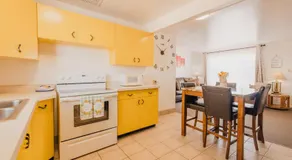 Home Style Apartments - 1 & 3 BR Suites with Full Kitchen - Image 2