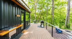 Modern Riverside Cabin w Hot Tub Fire Pit Kayaks - Image 5
