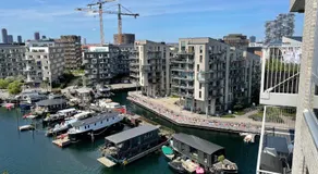 Luksuslejlighed på 7 sal med elevator, vestvendt altan og udsigt over havn og by - Image 4