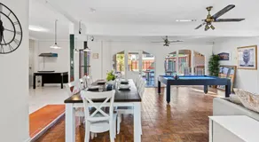 Sunny Stay 4BR with Pool in Prime Location - Image 5