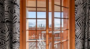 Appartement chalet avec balcon et vue sur les Alpes - Image 4